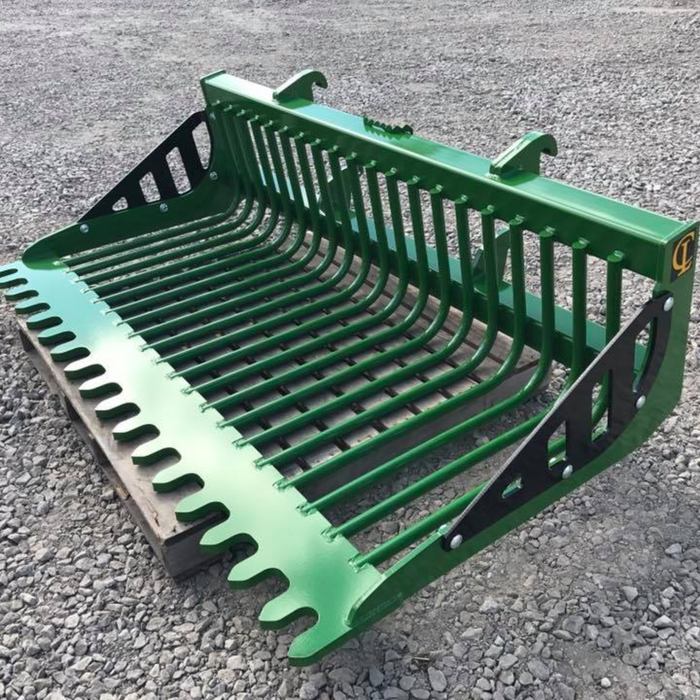 EZ ROCK BUCKET For large skid steers and compact track loaders Custom mounts are available for tractor loaders in four widths: 56″ / 72″ / 81″ / 90″ | CL Fabrication