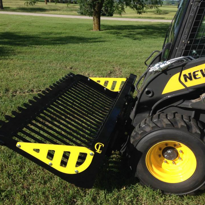 EZ ROCK BUCKET For large skid steers and compact track loaders Custom mounts are available for tractor loaders in four widths: 56″ / 72″ / 81″ / 90″ | CL Fabrication